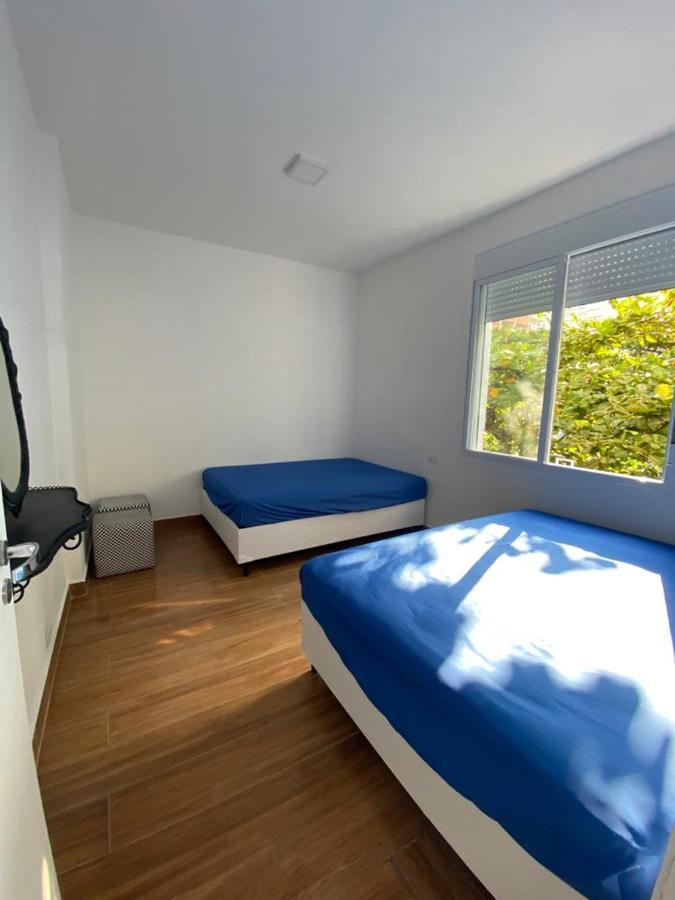 Apartamento Guaruja Pitangueiras 50 Metros Da Praia. Bagian luar foto
